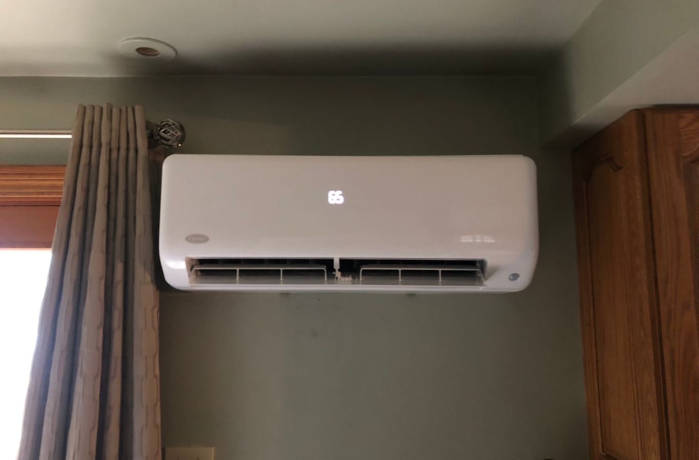 A Climate Systems technician installing an energy-efficient HVAC system in Seven Fields, PA, delivering comfort and savings to a local homeowner.