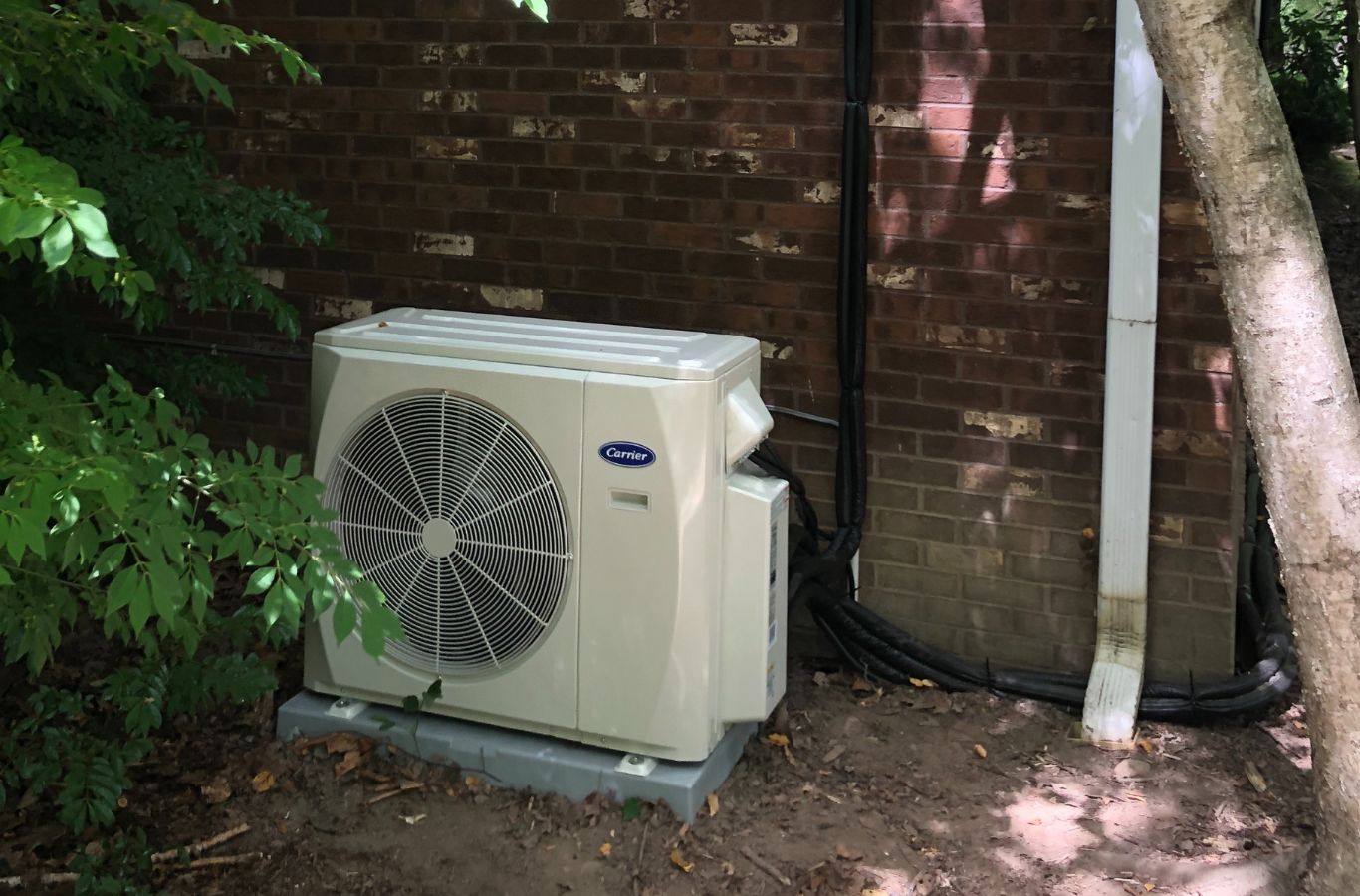 A Climate Systems team member installing an advanced HVAC system in Valencia, PA, providing energy-efficient and reliable performance.