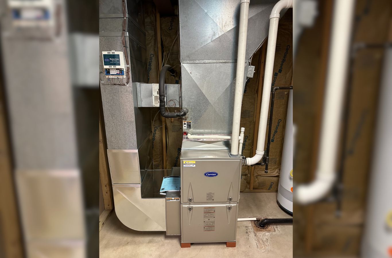 Climate Systems HVAC professionals working on a heating system in Valencia, PA, ensuring top-quality results and customer satisfaction. HVAC Contractor near me.