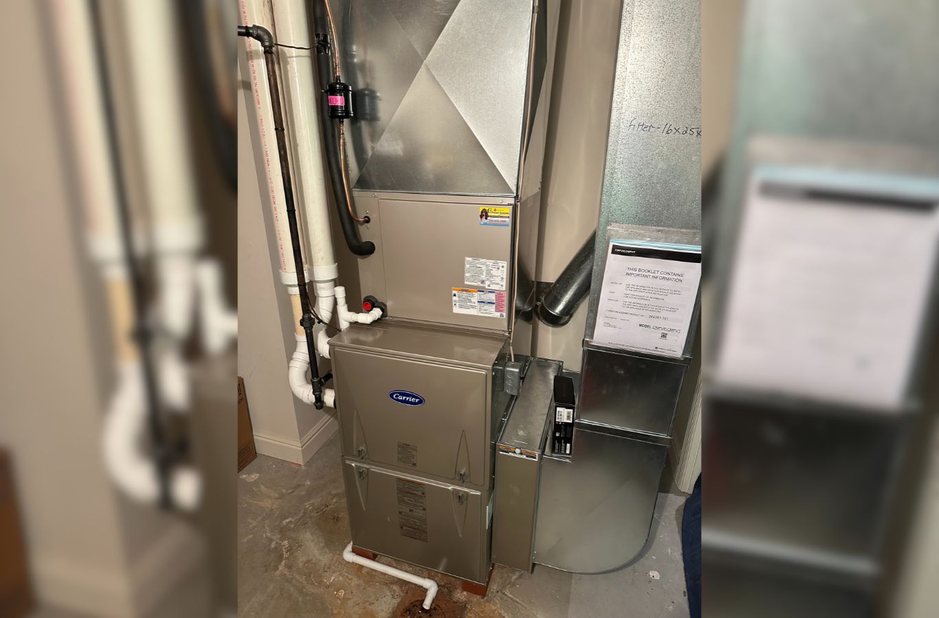 A Climate Systems Air Conditioning & Heating expert inspecting a furnace in Mars, PA, demonstrating professional repair services.