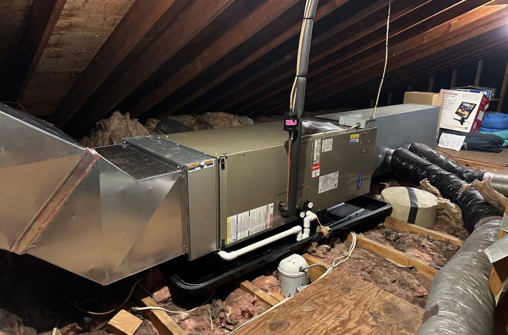 A Climate Systems Air Conditioning & Heating technician repairing a furnace in Adams Township, PA, ensuring reliable heating for a homeowner.