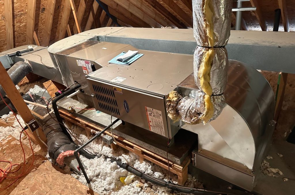 A Climate Systems Air Conditioning & Heating technician repairing a furnace in Franklin Park, PA, ensuring efficient heating performance.