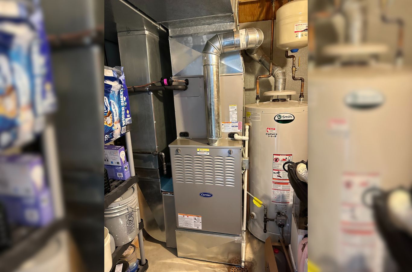 A skilled Climate Systems Air Conditioning & Heating technician repairing a furnace in Cranberry Township, PA, ensuring high-quality service. Furnace Repair near me.