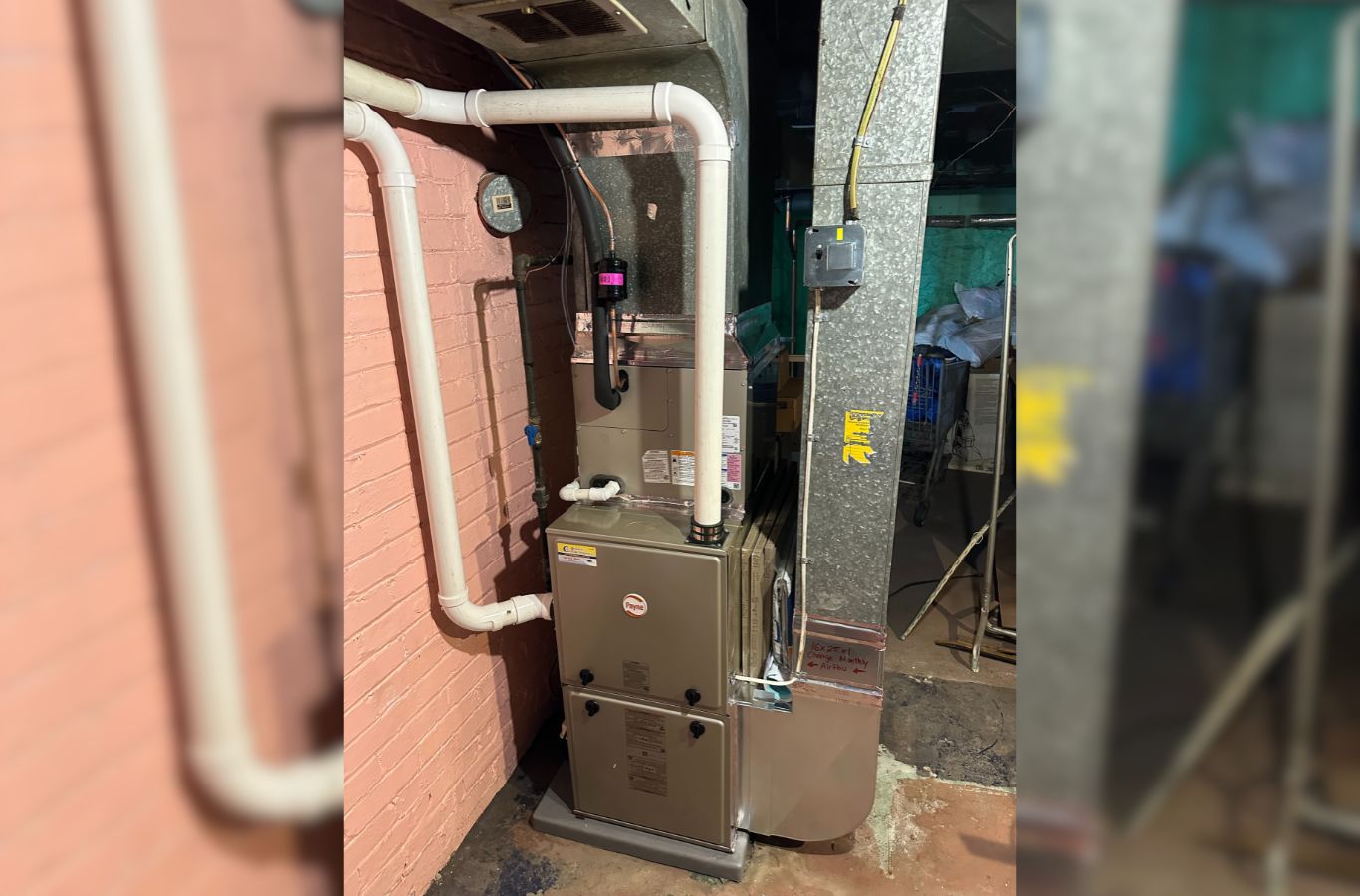 A skilled Climate Systems Air Conditioning & Heating technician restoring a furnace in McCandless, PA, ensuring quality and system performance. Furnace Repair near me.